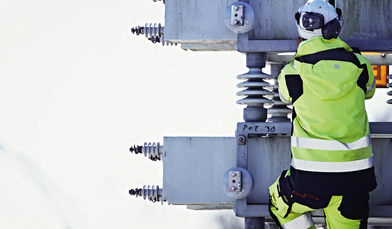 Arc-rated protective workwear for electrical utility workers