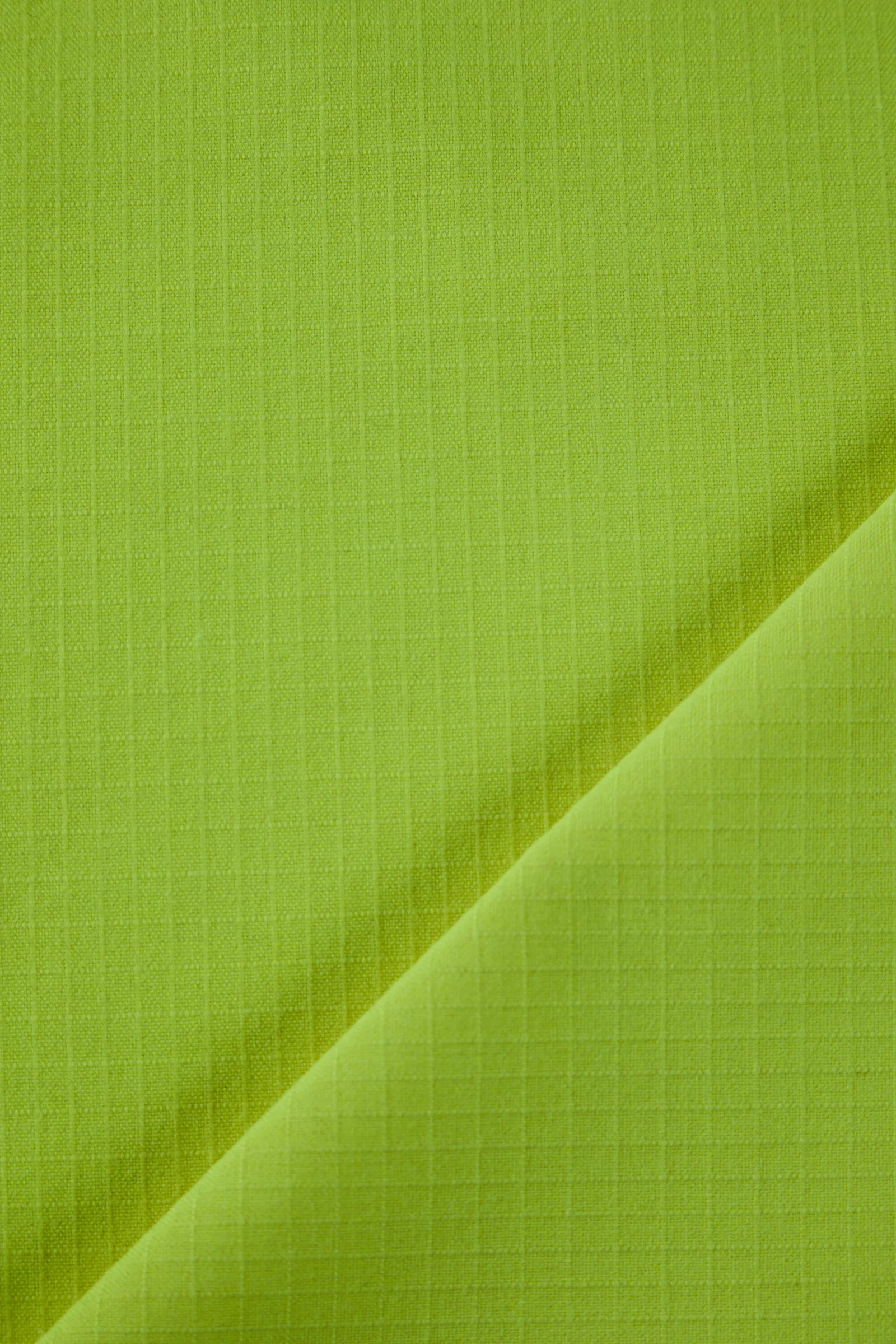 Close-up of high-visibility MARKO AS protective fabric
