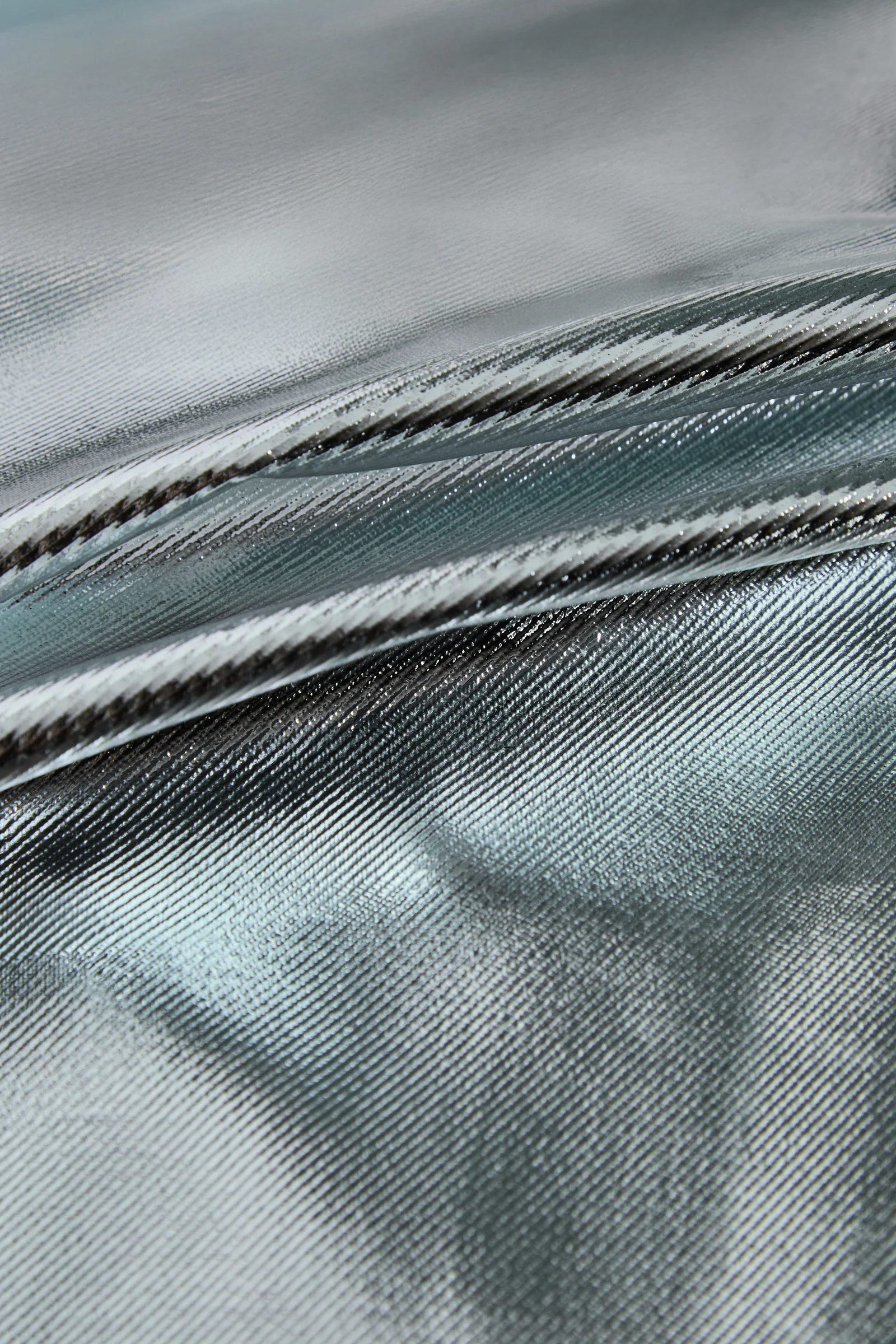 Close-up of aluminized PREOX fabric for steel and iron foundries