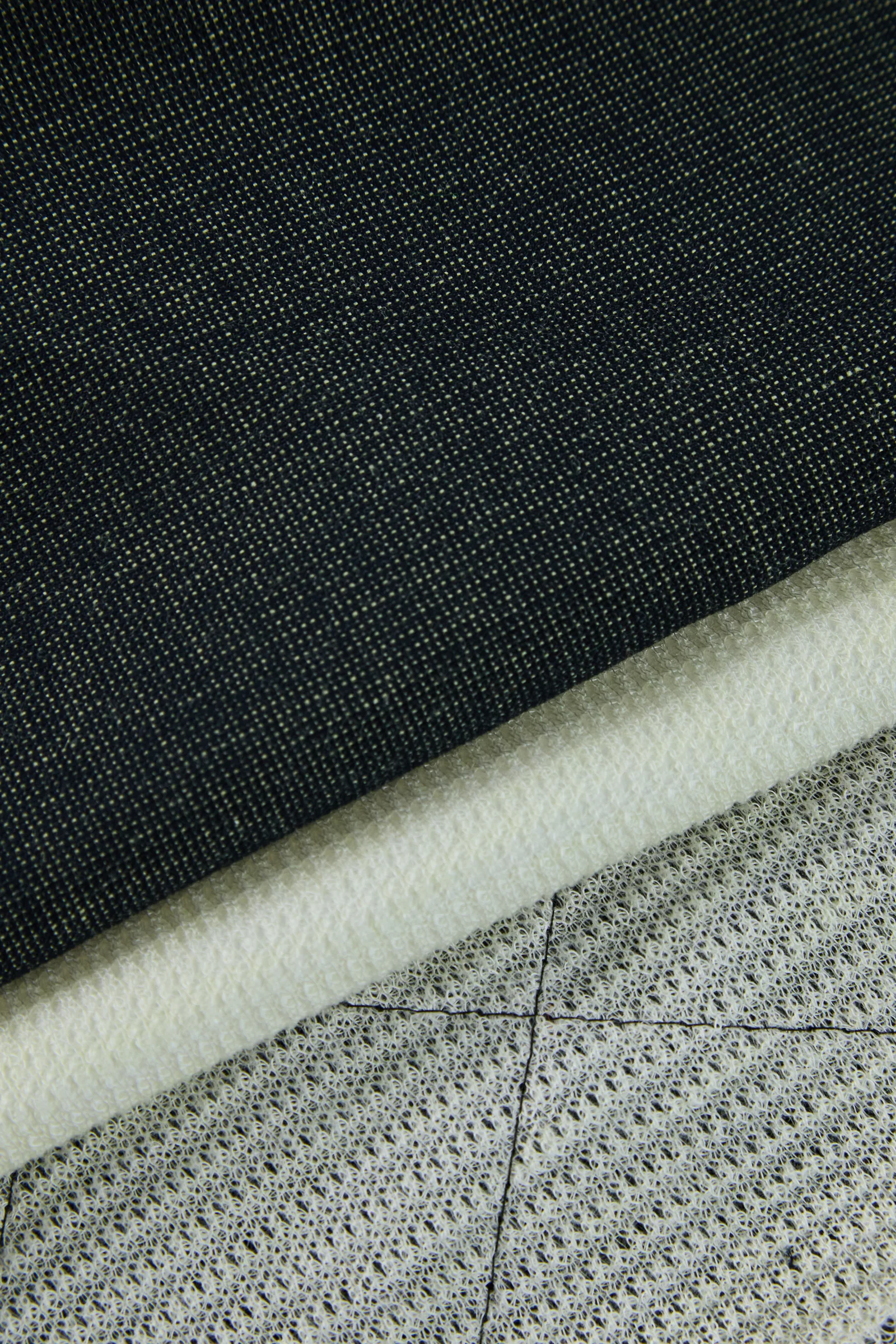 Layered EN 469 protective fabrics for structural firefighting